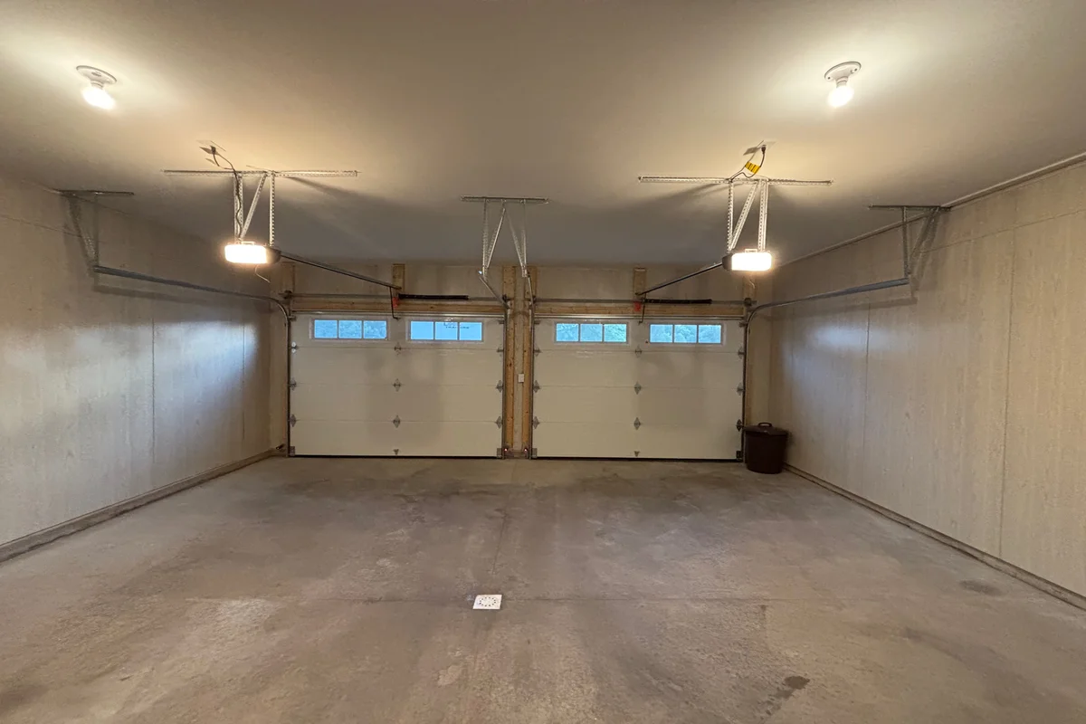 After: Transformed garage with modern storage solutions